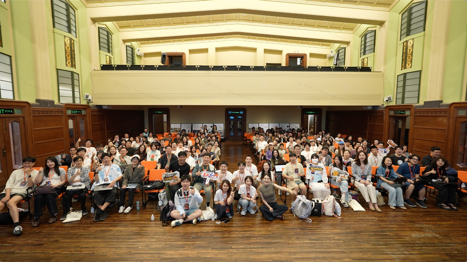 Creators gather for a group photo after an international Eazo community event.